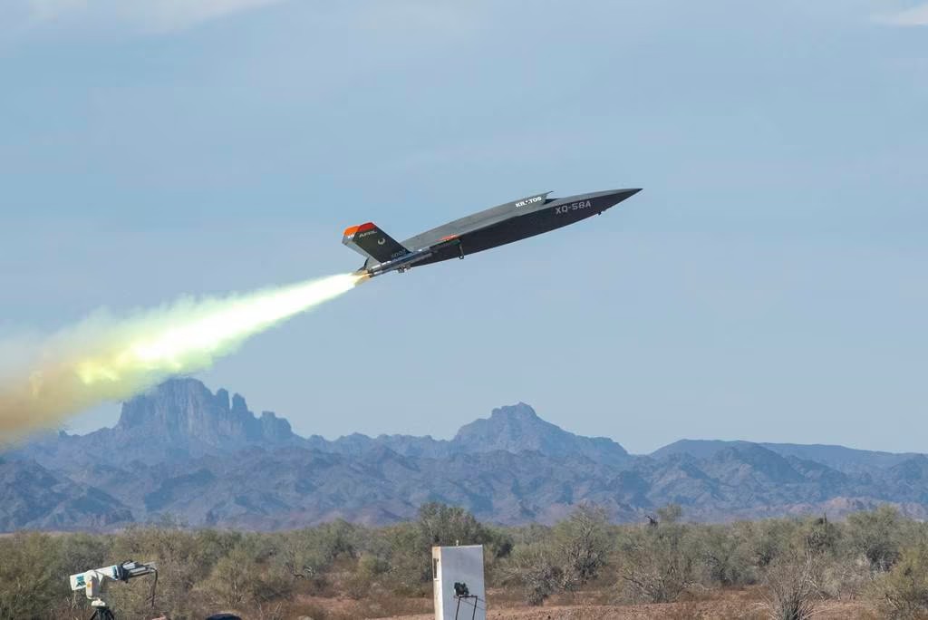 An XQ-58A Valkyrie drone launches at Yuma Proving Ground, Ariz., in 2020 to demonstrate the transfer of data among aircraft. (Staff Sgt. Joshua King/U.S. Air Force)